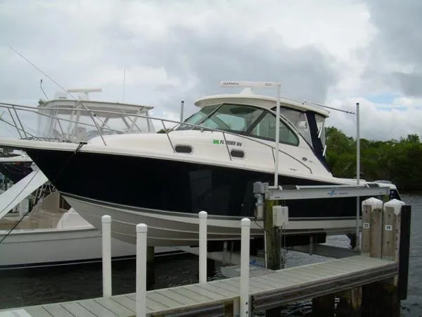 Slide: The Image of Pursuit 315 Offshore Express 2009 - 11