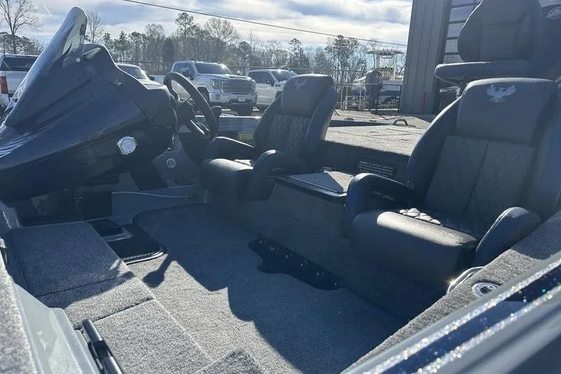 Slide: The Image of Interior of 2026 Phoenix 721 ZXL boat with dual seats and steering console. - 10