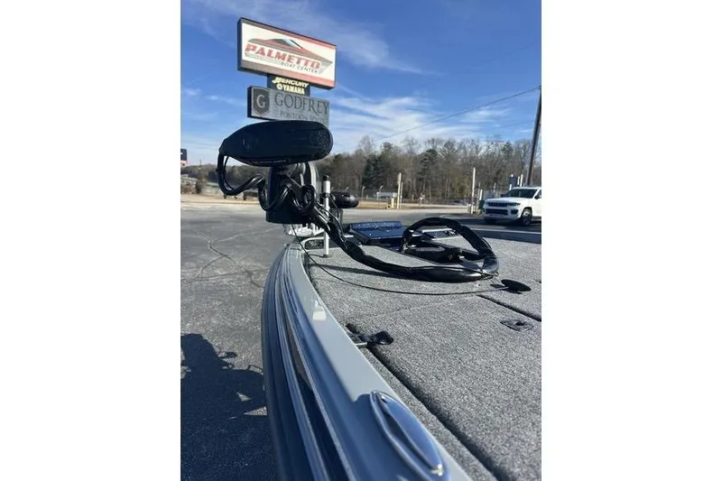 Slide: The Image of 2026 Phoenix 721 ZXL boat at dealership, featuring sleek design and advanced equipment. - 4