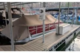 Slide: The Image of Covered 2012 Crest CHILLER CP2 boat docked at marina. - 1