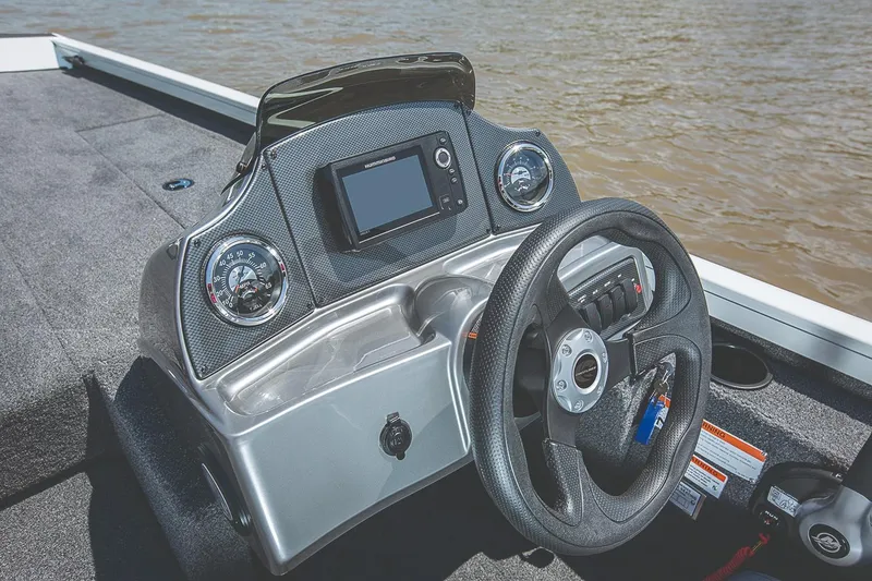 Slide: The Image of Manufacturer Provided Image: 2019 Crestliner VT 18 boat dashboard with steering wheel and electronic display. - 25