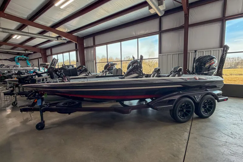 The Image of 2026 Skeeter FXR20 FLEX bass boat in showroom, side view. - 0