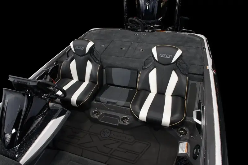 Slide: The Image of Manufacturer Provided Image: 2026 Skeeter FXR20 FLEX boat interior with dual black and white seats. - 15
