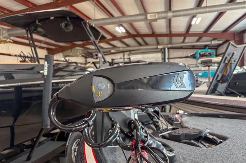 Slide: The Image of 2026 Skeeter FXR20 FLEX boat detail in a showroom with advanced equipment. - 2