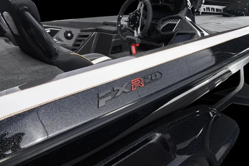 Slide: The Image of Manufacturer Provided Image: 2026 Skeeter FXR20 FLEX boat interior with sleek design and modern controls. - 21