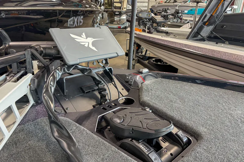 Slide: The Image of 2026 Skeeter FXR20 FLEX boat interior with advanced control panel and sleek design. - 3