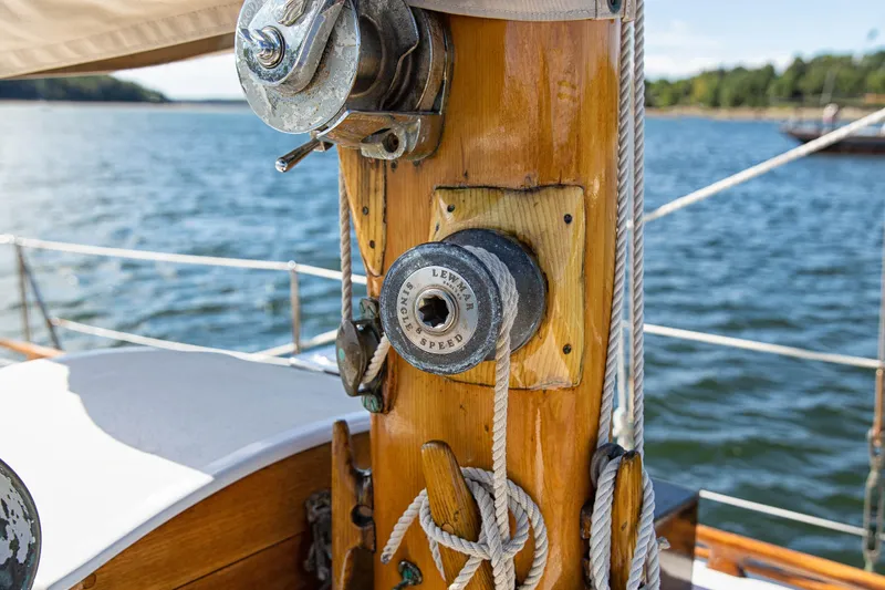 Slide: The Image of Close-up of 1957 Sparkman & Stephens K/CB Yawl mast with winch and ropes. - 20