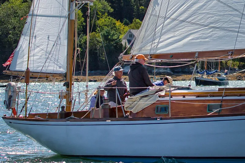 Slide: The Image of 1957 Sparkman & Stephens K/CB Yawl sailing on a sunny day with crew onboard. - 30