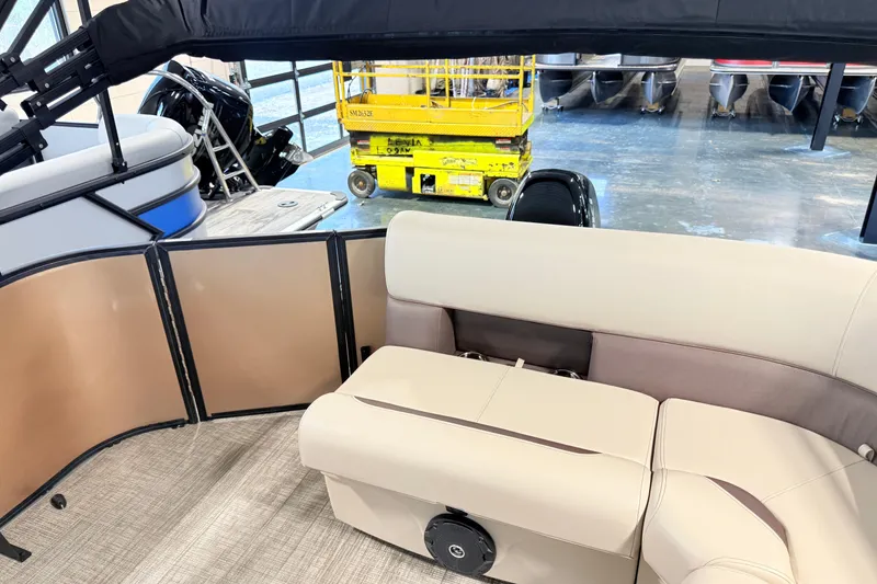 Slide: The Image of Interior of 2026 Bentley Pontoons LE 180CR with beige seating and modern design. - 10