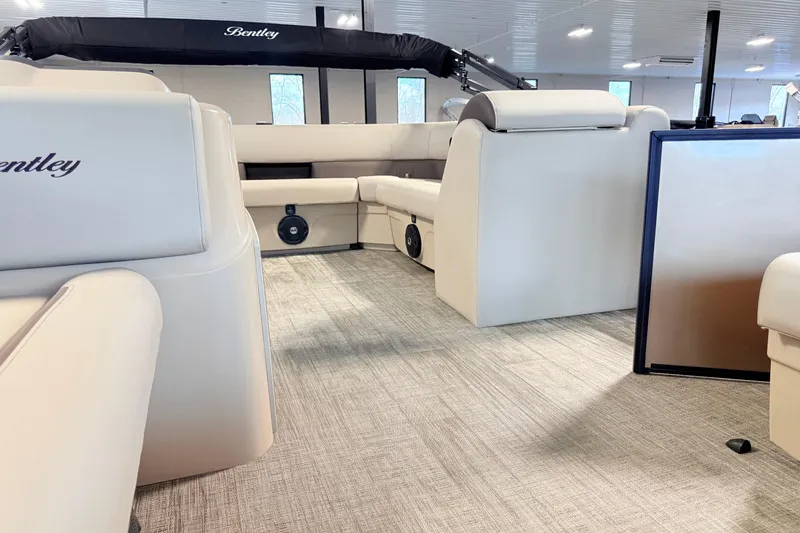 Slide: The Image of Luxurious interior of 2026 Bentley Pontoons LE 180CR with plush seating and modern design. - 9