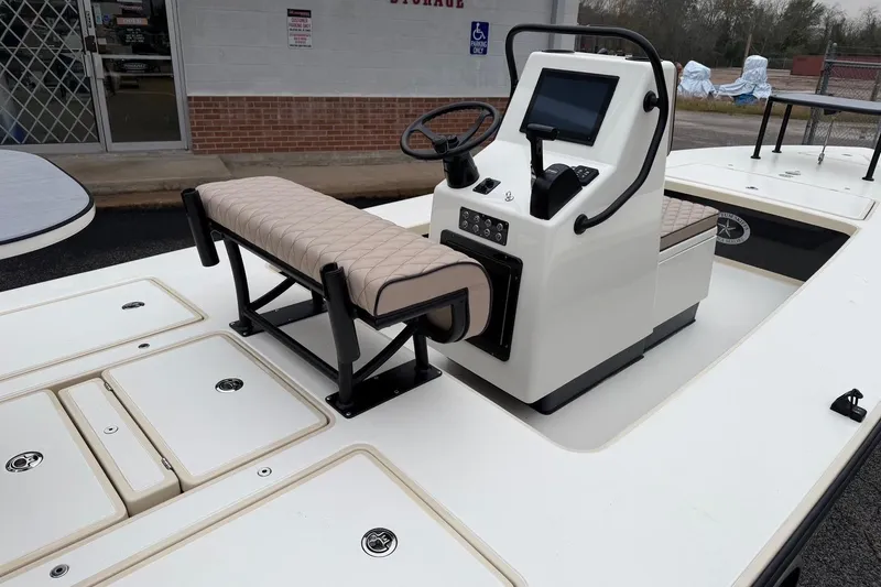 Slide: The Image of 2026 Chittum Skiffs 21 Laguna Madre boat interior with steering console and seating. - 12