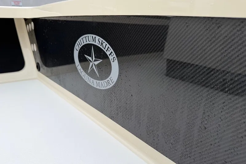 Slide: The Image of 2026 Chittum Skiffs 21 Laguna Madre boat with carbon fiber detailing. - 17