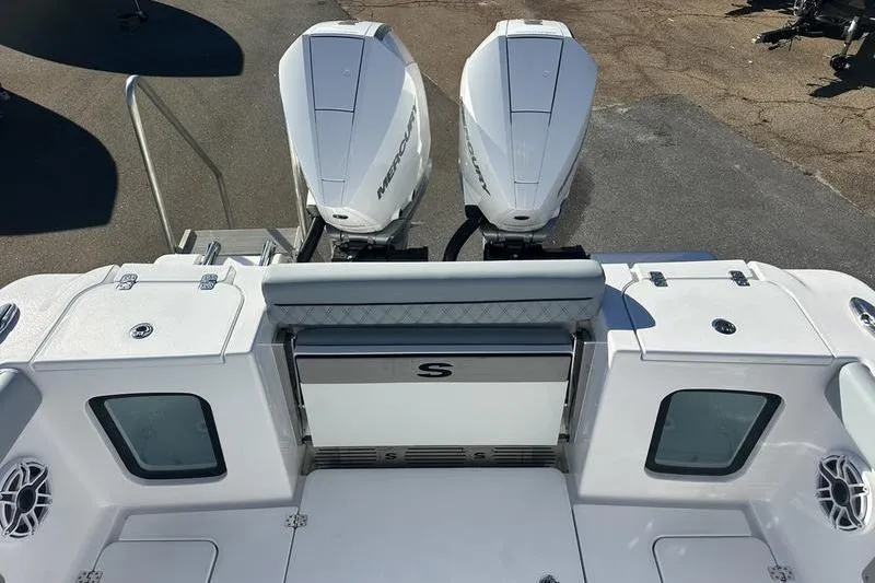 Slide: The Image of 2026 Sportsman Open 282 Center Console with dual Mercury outboard engines. - 37