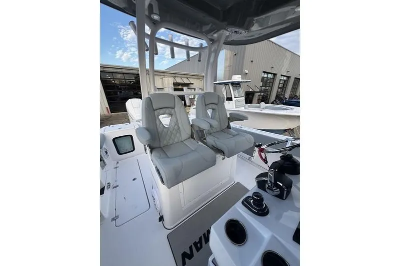Slide: The Image of 2026 Sportsman Open 282 Center Console with dual seats and modern controls. - 7