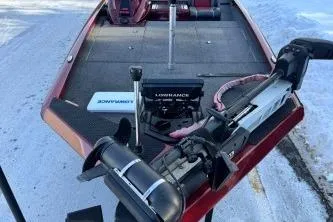 Slide: The Image of 2018 Ranger RT198P fishing boat with trolling motor and electronics on snowy ground. - 6