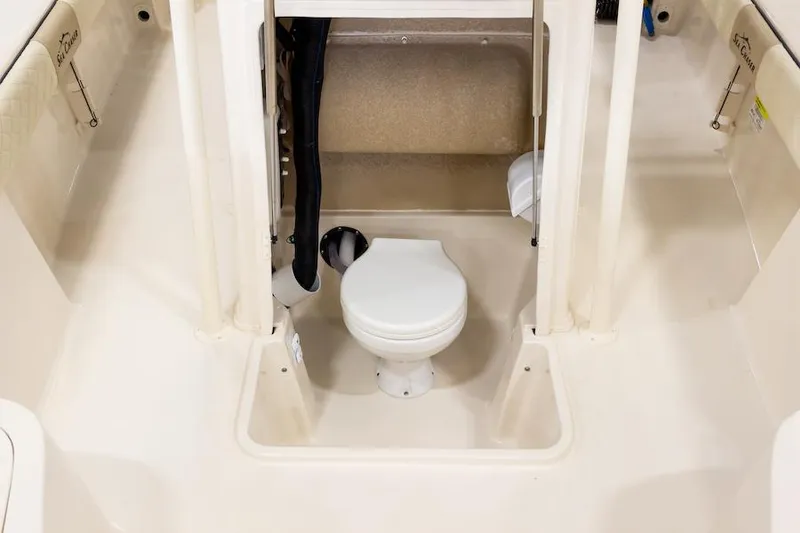 Slide: The Image of Manufacturer Provided Image: Interior of 2026 Sea Chaser 23 LX featuring a toilet. - 13