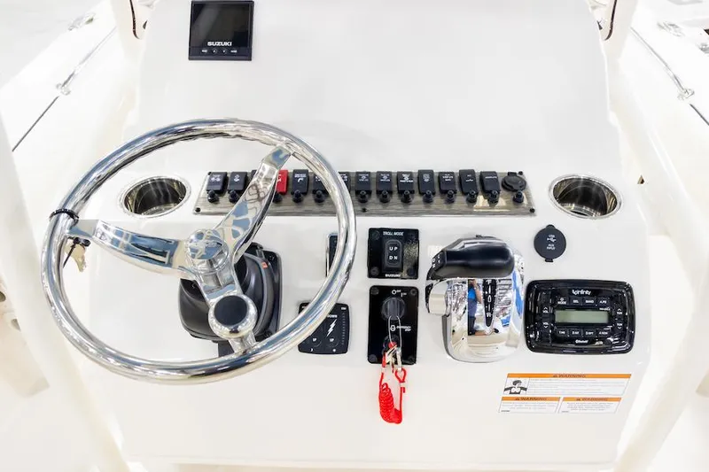 Slide: The Image of Manufacturer Provided Image: 2026 Sea Chaser 23 LX boat with anglers on calm water. - 7