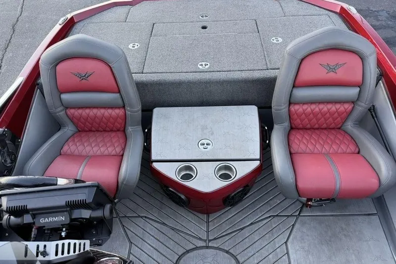 Slide: The Image of 2021 Vexus VX20 boat interior with red and gray seats, center console, and Garmin device. - 16