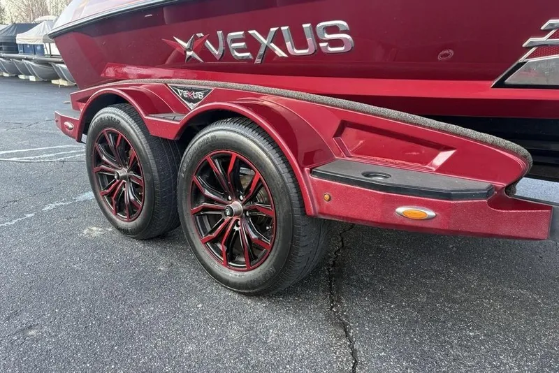 Slide: The Image of Red 2021 Vexus VX20 boat trailer with stylish black and red wheels. - 8