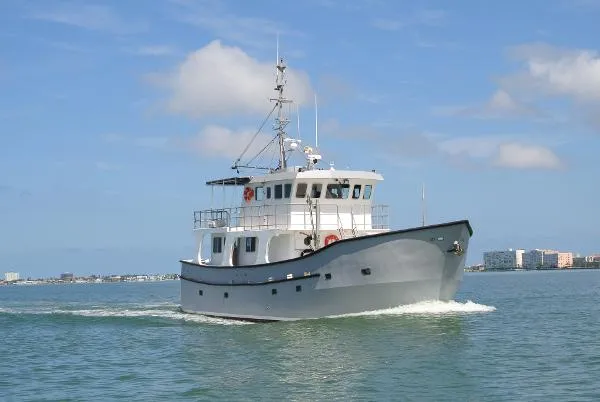 Slide: The Image of Dixon Boat Builders Pilothouse Expedition Style 1996 - 1