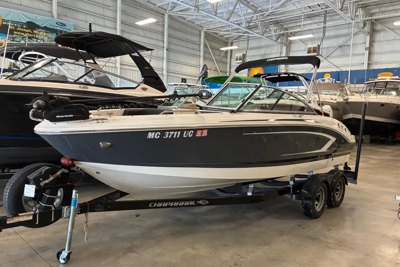 The Image of 2017 Chaparral 21 H2O Ski & Fish boat in showroom, on trailer. - 0