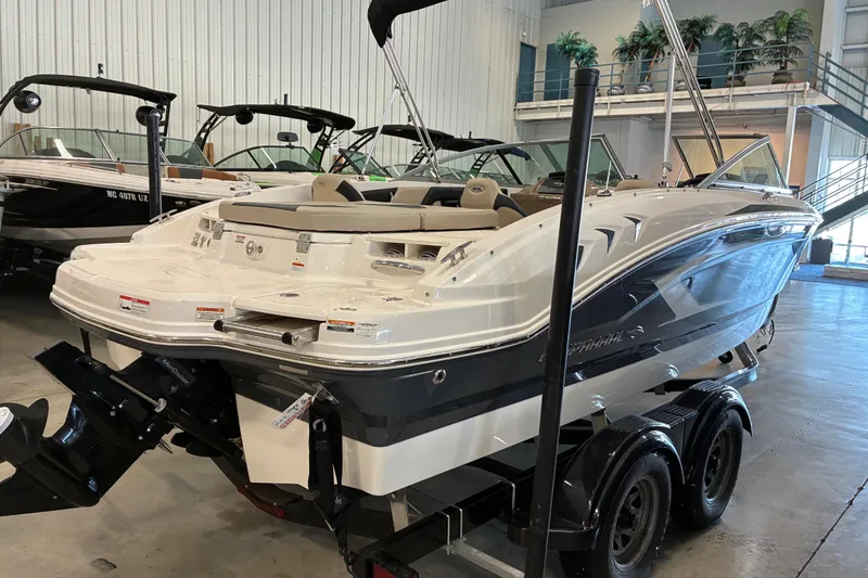 Slide: The Image of 2017 Chaparral 21 H2O Ski & Fish boat in showroom, on trailer. - 17