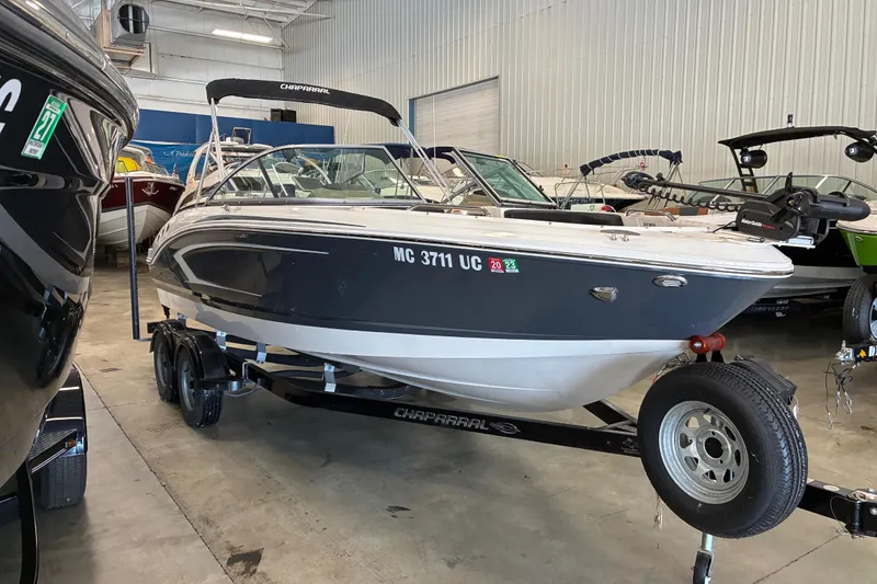 Slide: The Image of 2017 Chaparral 21 H2O Ski & Fish boat on trailer in showroom. - 2