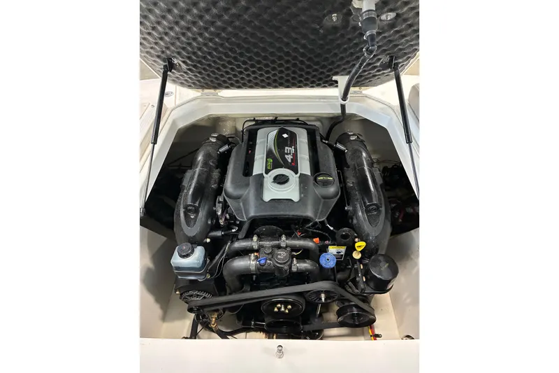 Slide: The Image of 2017 Chaparral 21 H2O Ski & Fish boat engine compartment view. - 3