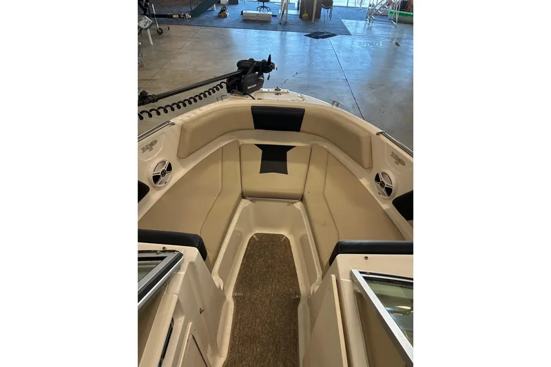 Slide: The Image of 2017 Chaparral 21 H2O Ski & Fish boat interior with seating and speakers. - 5