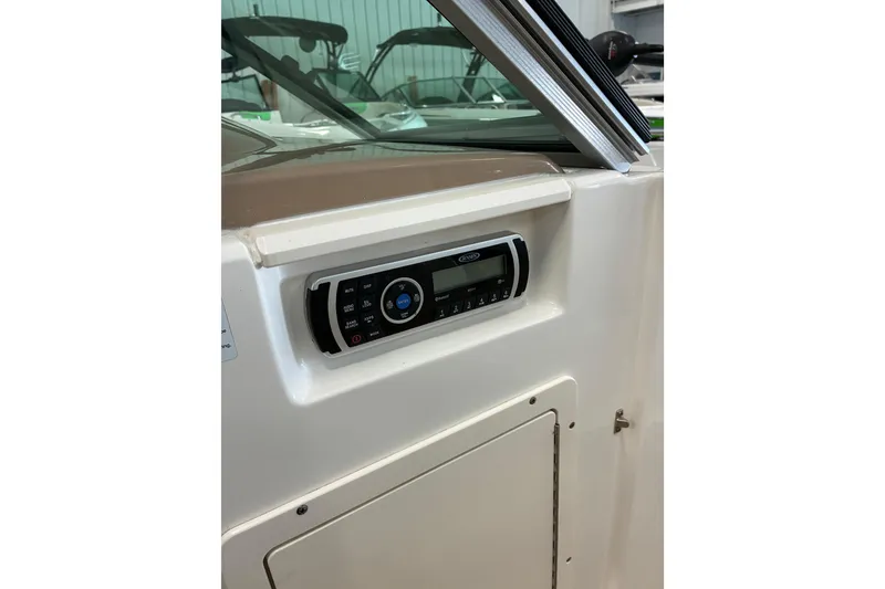 Slide: The Image of 2017 Chaparral 21 H2O Ski & Fish boat dashboard with stereo system. - 9