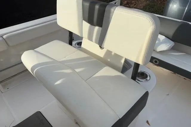 Slide: The Image of Seating area of 2023 Robalo R222 Center Console boat. - 14