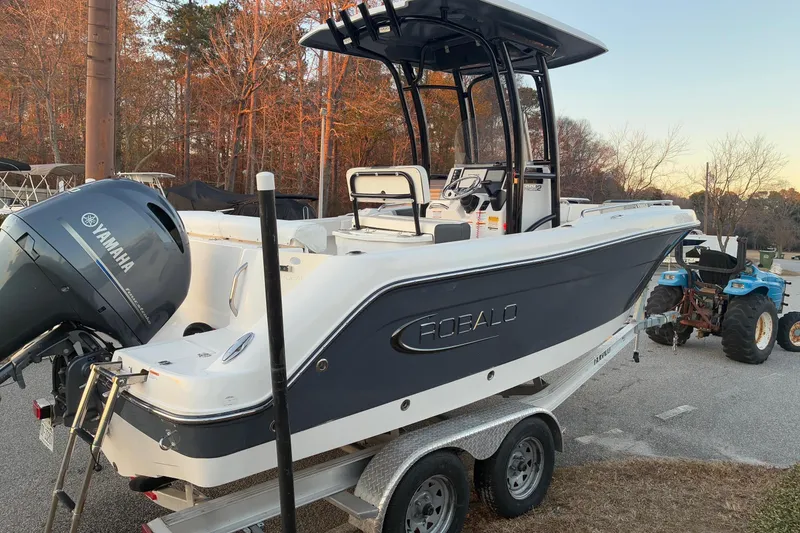 Slide: The Image of 2023 Robalo R222 Center Console boat with Yamaha engine. - 3