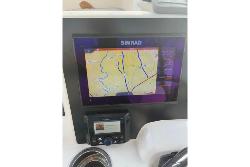 Slide: The Image of Simrad navigation system in Robalo R222 Center Console 2023. - 4