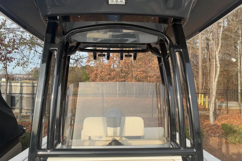 Slide: The Image of 2023 Robalo R222 Center Console boat outdoors. - 8