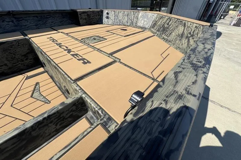 Slide: The Image of 2026 Tracker Grizzly 1756 T Marsh boat interior with camo design and spacious deck. - 13