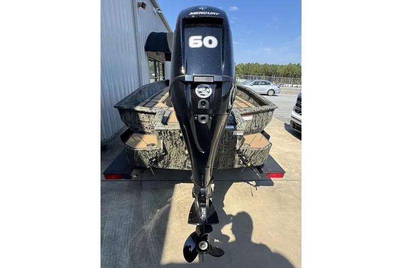 Slide: The Image of 2026 Tracker Grizzly 1756 T Marsh boat with Mercury 60 outboard motor. - 3