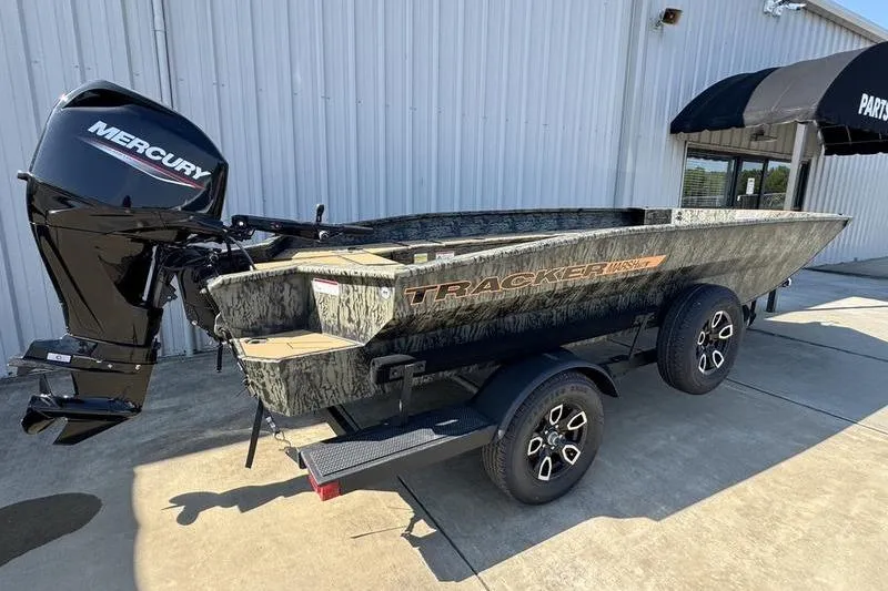 Slide: The Image of 2026 Tracker Grizzly 1756 T Marsh boat on trailer, featuring Mercury outboard motor. - 5