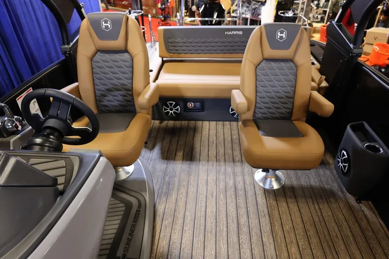 Slide: The Image of 2026 Harris Sunliner 230 Sport interior with luxurious seating and modern design. - 12