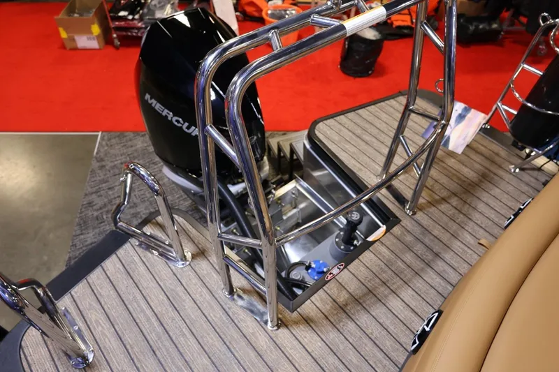 Slide: The Image of 2026 Harris Sunliner 230 Sport boat with Mercury engine and sleek deck design. - 18