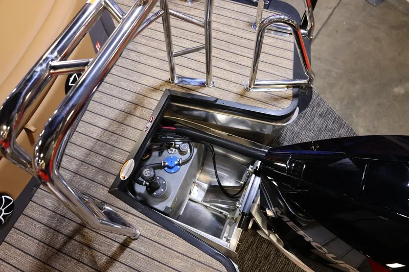 Slide: The Image of 2026 Harris Sunliner 230 Sport boat engine compartment with chrome railings and detailed components. - 20