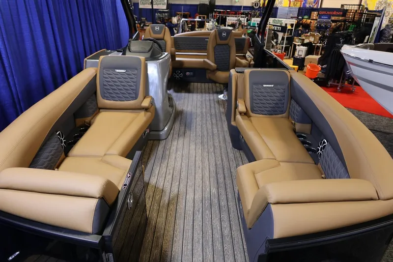 Slide: The Image of 2026 Harris Sunliner 230 Sport pontoon boat interior with luxurious seating and modern design. - 3