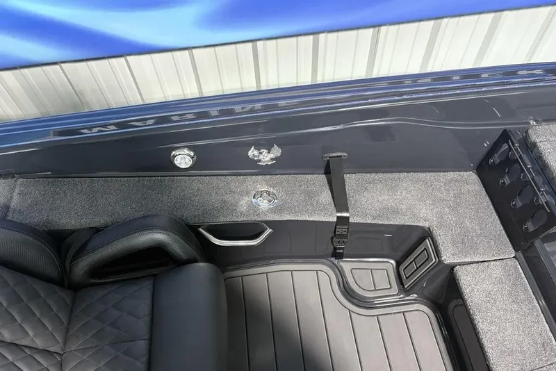 Slide: The Image of Interior of 2026 Phoenix 919 ZXL boat with sleek seating and modern design elements. - 15