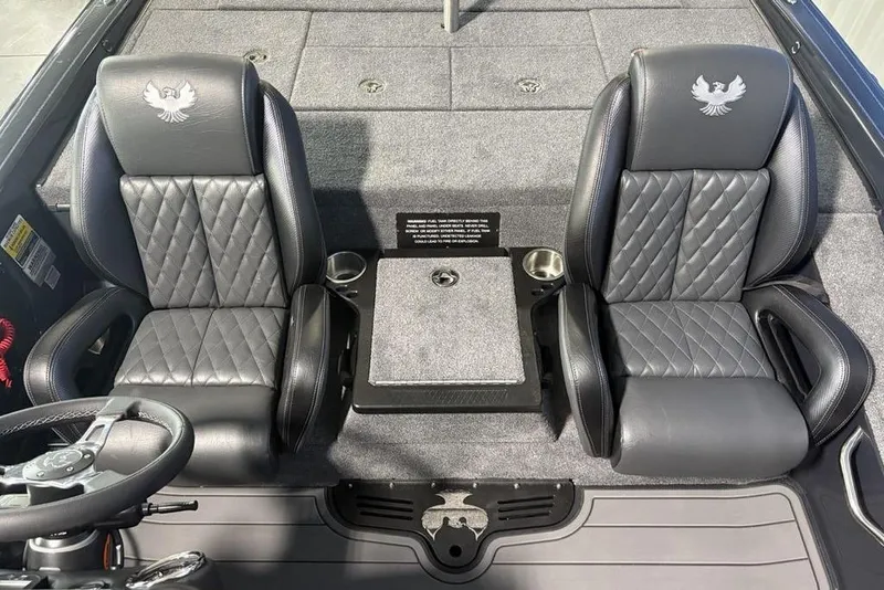 Slide: The Image of Luxury seating in 2026 Phoenix 919 ZXL boat with quilted leather and cup holders. - 17