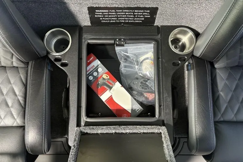 Slide: The Image of Interior of 2026 Phoenix 919 ZXL with storage compartment and cup holders. - 18