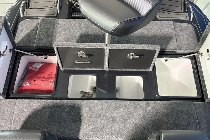Slide: The Image of Interior storage compartments of 2026 Phoenix 919 ZXL boat, featuring organized layout. - 22
