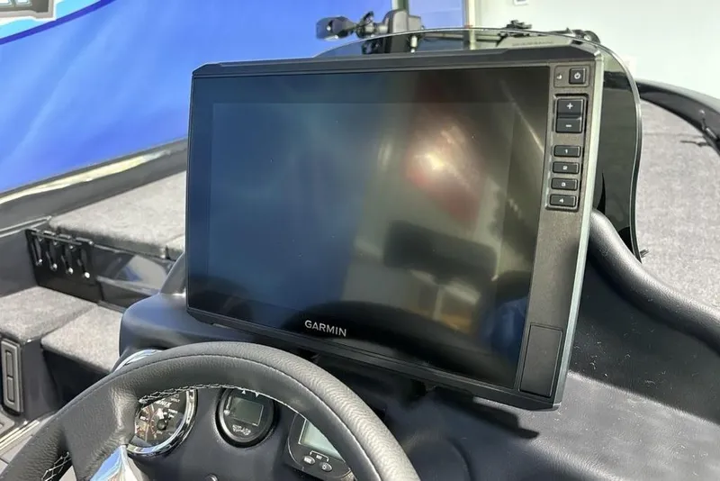 Slide: The Image of Dashboard of 2026 Phoenix 919 ZXL with Garmin display and steering wheel. - 23