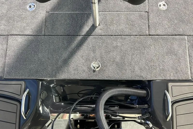 Slide: The Image of 2026 Phoenix 919 ZXL boat deck with carpeted surface and storage compartments. - 26