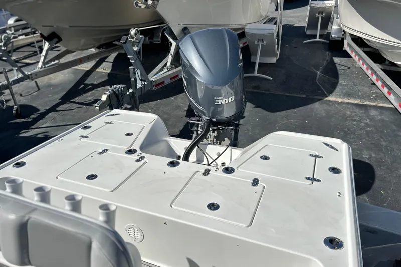 Slide: The Image of 2011 Cape Horn 23 Cape Bay boat with Yamaha 300 engine, docked on trailer. - 23