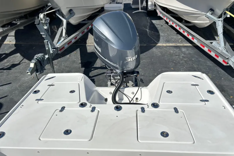 Slide: The Image of 2011 Cape Horn 23 Cape Bay boat with Yamaha 300 engine, docked on trailer. - 24