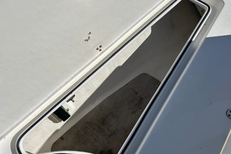 Slide: The Image of Storage compartment of a 2011 Cape Horn 23 Cape Bay boat, open and empty. - 19
